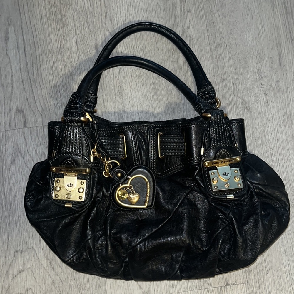 Juicy Couture beautiful leather bag. “Born in the USA”​